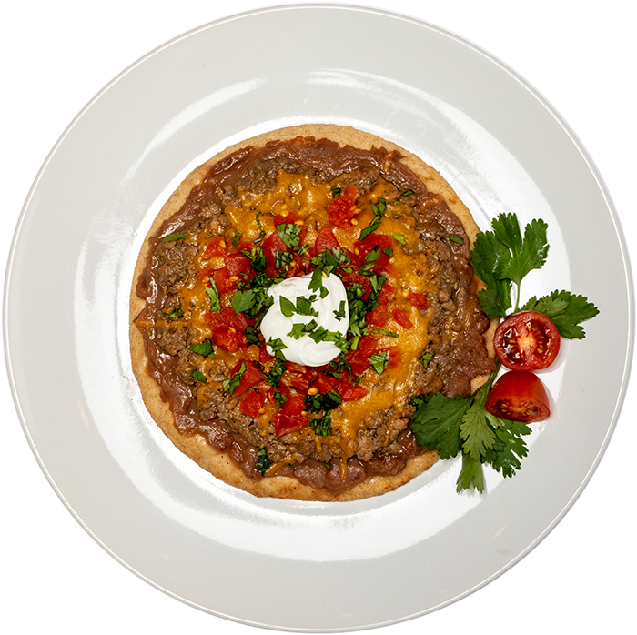 Image of the Philly Ground Beef Crumble product on a plate, with other assorted foods